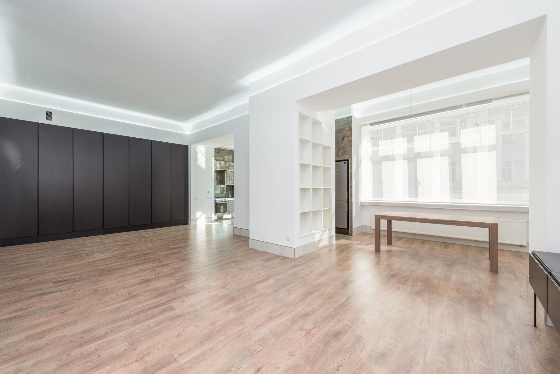 A bright, cleared living room after a junk removal pickup in Dallas